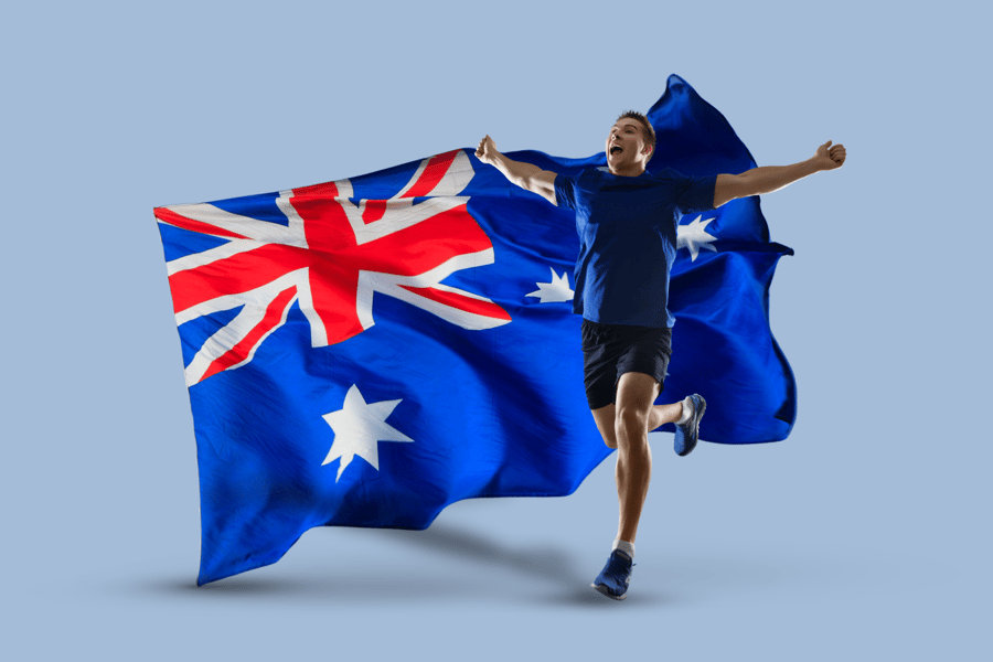 Marathon runner next to the Australian flag.