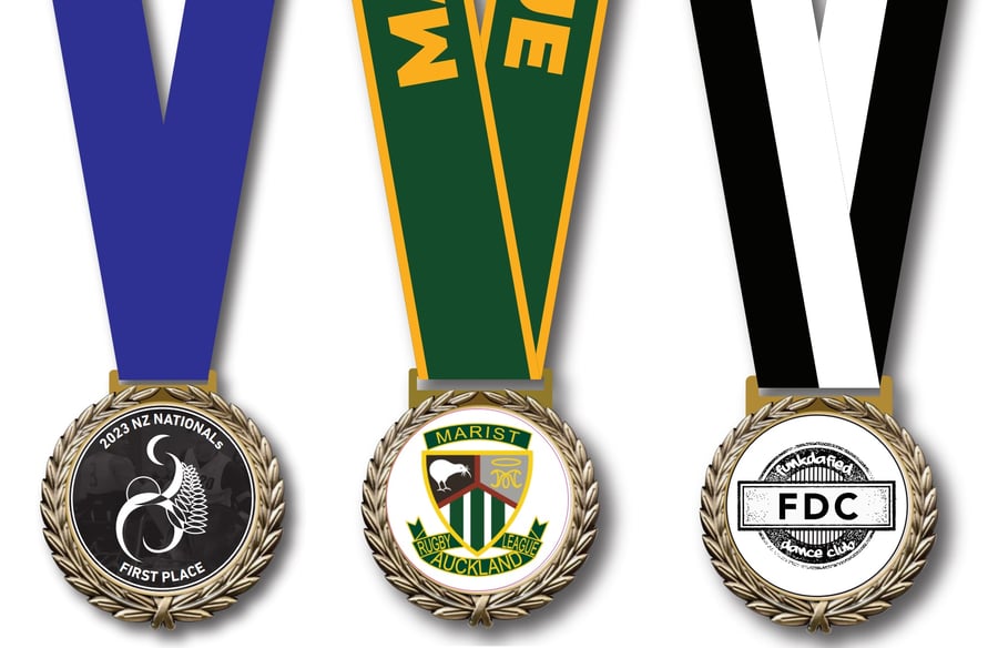 Three examples of insert medals, made by Badges And Medals for customers.