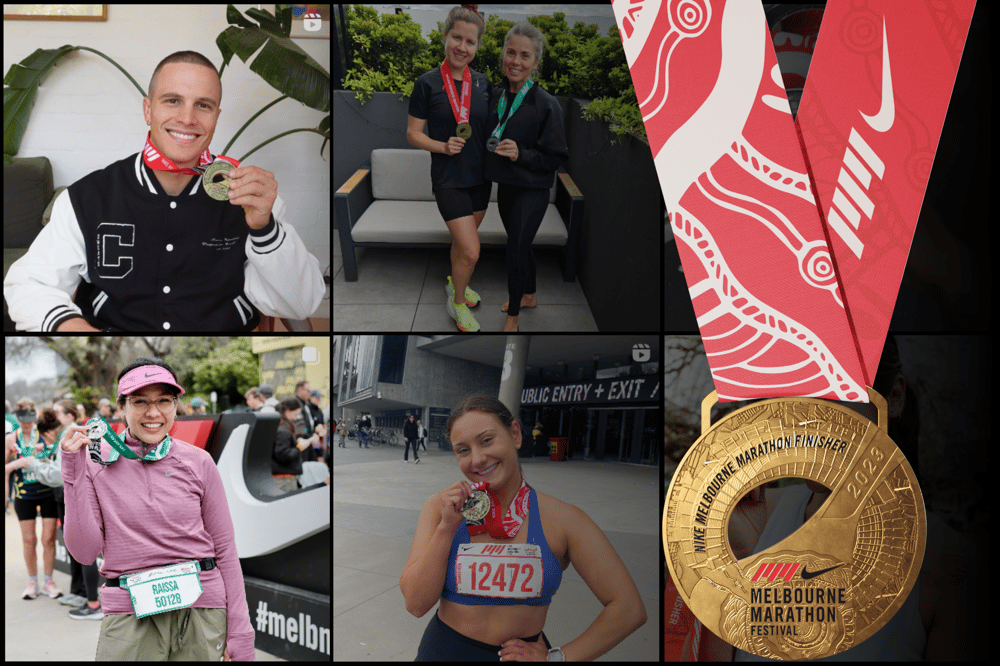 Nike Melbourne Marathon runners pose with their custom medals.