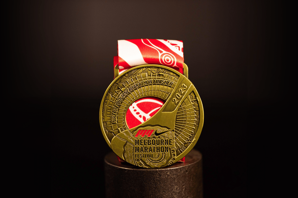 Close up of the custom Melbourne Marathon 'Marathon' medal.