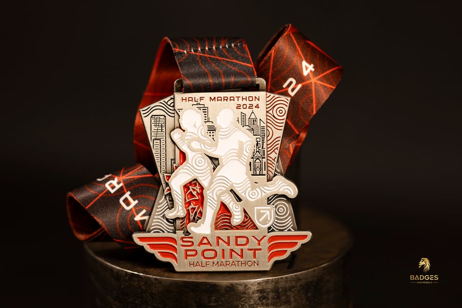 Custom Sandy Point Half Marathon medal.